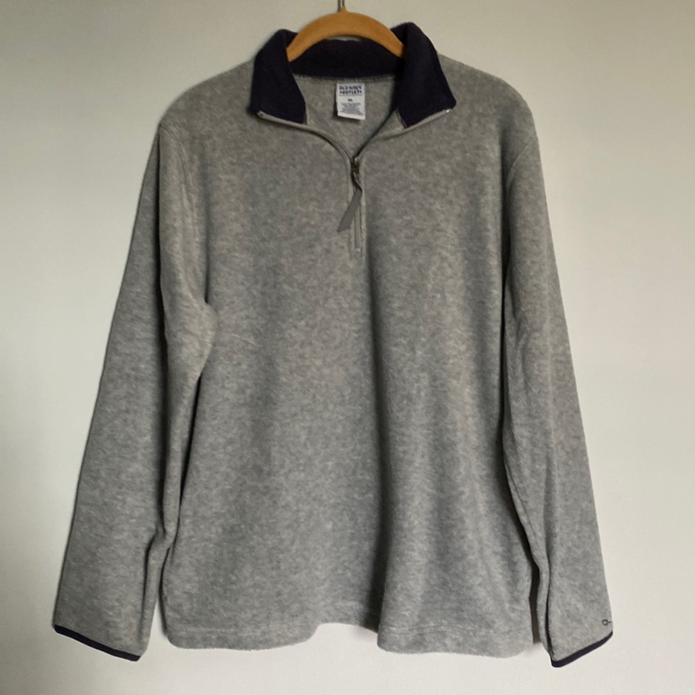 Grey & Blue soft plush shirt.  Pockets on each side, zipper in front, pull on.
